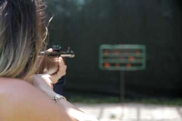 Woman Using Red Dot Optics