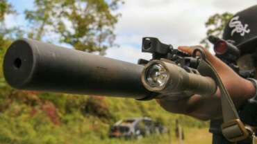 person holding a used vortex scope